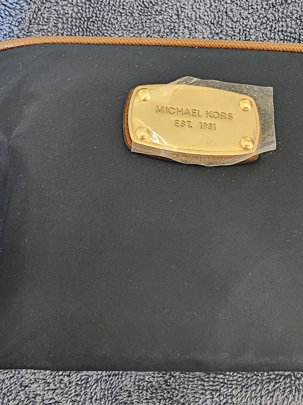 Michael Kors Navy Lg TRAVEL POUCH with Gold Plaque